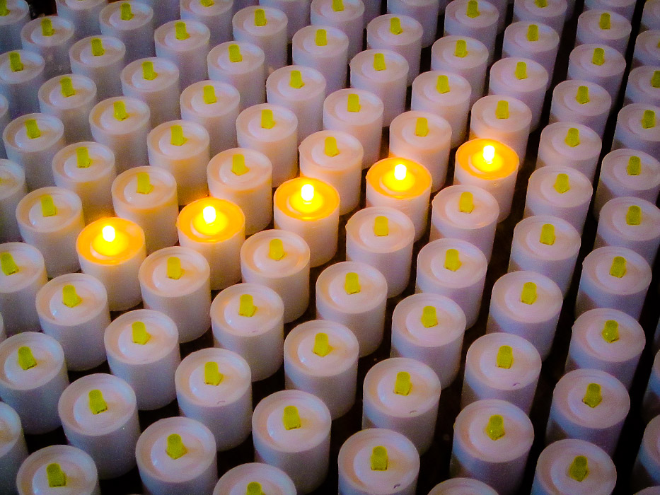 Lighting a Candle in the Cathederal - Barcelona